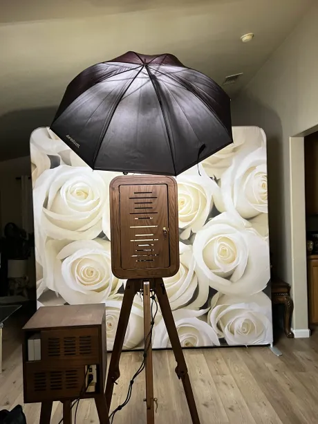 Vintage wood photo booth setup